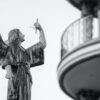shallow focus architectural photography of angel statue